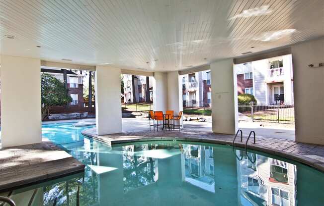 Covered pool area at The Falls Apartments in Raleigh NC