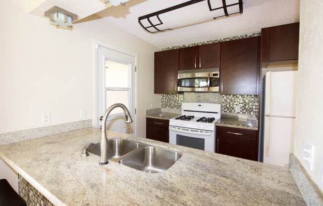 3-Bedroom Townhome with 2 Parking, AC, W&D and Backyard in LIOLIO, WAIPAHU– Upstairs Renovation in Progress!