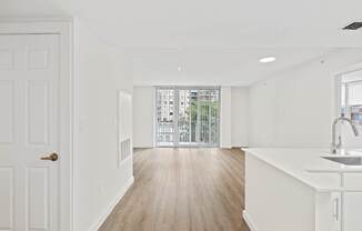 renovated unit with Kaindl flooring throughout