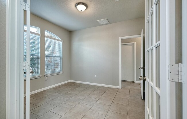 Beautiful 4/2.5/2 two story with office on oversized corner lot!