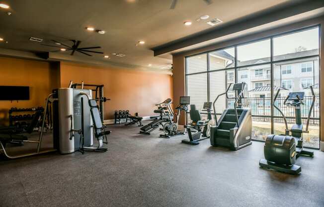 the gym at the district flats apartments in lenexa