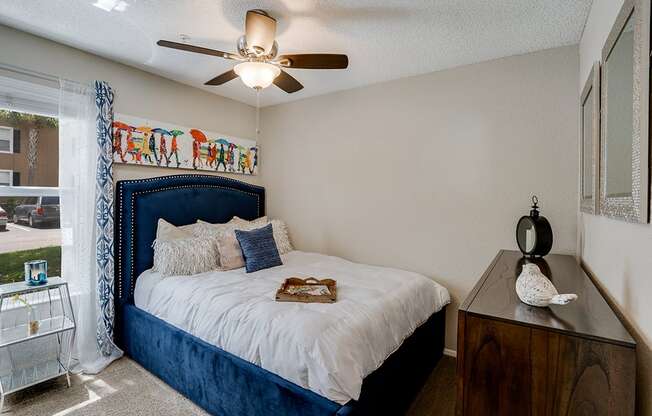 Bedroom with Ceiling Fan and Light