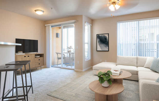 Carpeted Bedroom with Balcony