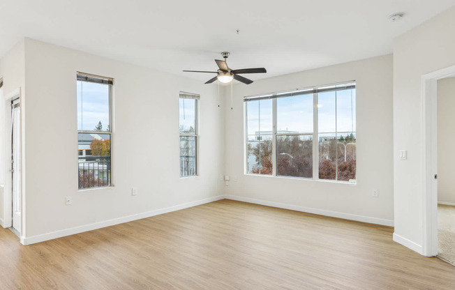 living room with balcony hard surface flooring
