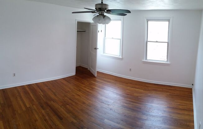 Modern 2 Bed/1 Bath row house with off-street parking!