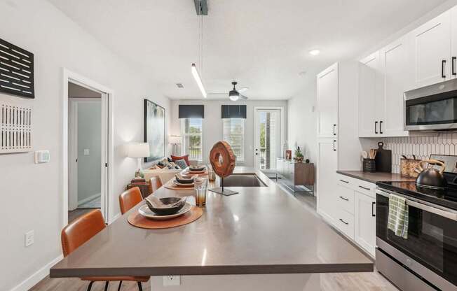 Furnished kitchen in one bedroom apartment model