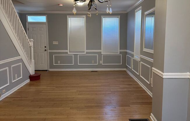Spacious Home for Rent! Open Floor-Plan! Partially Finished Basement! Front Porch & Fenced in Yard! Available Now!