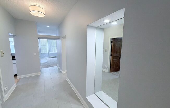 Light-Filled Cathedral Hill Condo with Vaulted Ceilings & Garage!