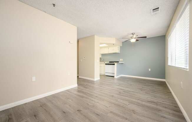 a bedroom with hardwood floors and a ceiling fan at Sagewood Gardens Senior Apartments, Hacienda Heights California