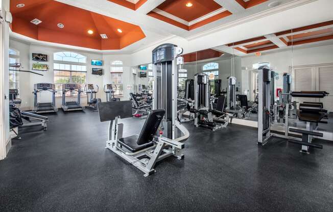 Gym with weights equipment at Rapallo Apartments  in Kissimmee, Florida