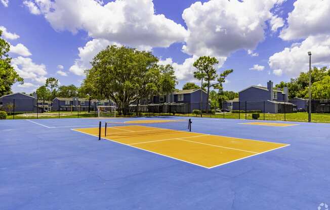 the tennis court at the estates apartments