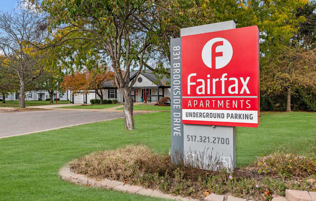 A sign for Fairfax Apartments with underground parking.