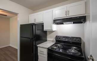 This is a photo the kitchen of an upgraded 1030 square foot, Oak 2 bedroom, 1 bath apartment at Montana Valley Apartments in the Westwood neighborhood of Cincinnati, OH.