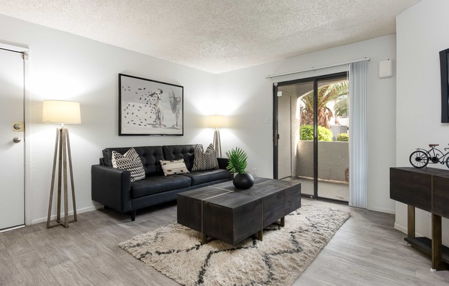 a living room with a couch and a coffee table