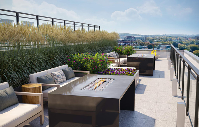 a roof top lounge with a view of the city at Link Apartments® H Street, Washington, Washington