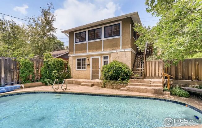 Charming Historic Carriage Home Steps from Pearl Street - Boulder Living at Its Finest!