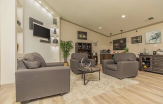 Experience the elegance of The Riley, where modern design meets cozy living. Our inviting common area features stylish furnishings and a warm ambiance, perfect for relaxation and social gatherings. Explore your new home today!