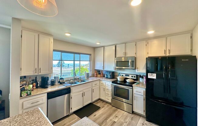 3 Bedroom Townhome near USD!! Parking + Laundry Included!!