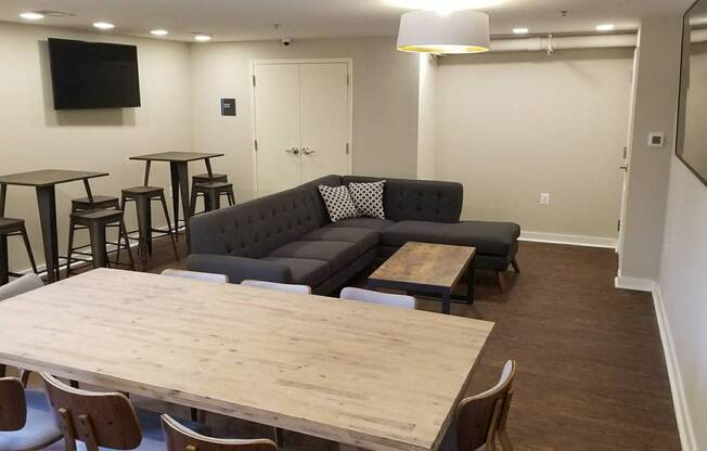 a living room with a couch and a table