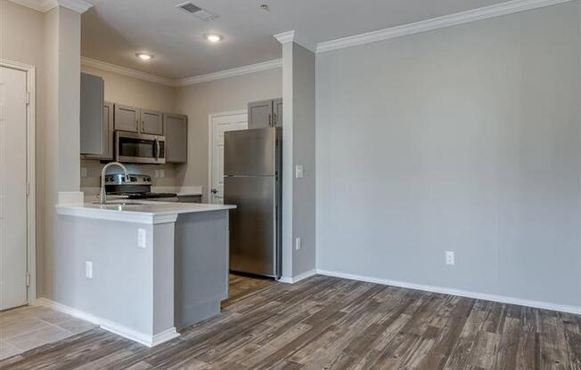 Sycamore Farms_ Livingroom with tall windows and hardwood floors _Weidner