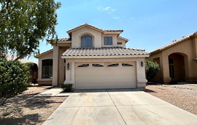 Spacious 4-Bedroom 3-Bath Peoria Home with Vaulted Ceilings & Large Backyard