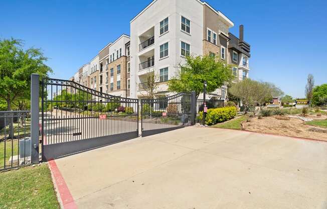 A large building with a gate in front of it.