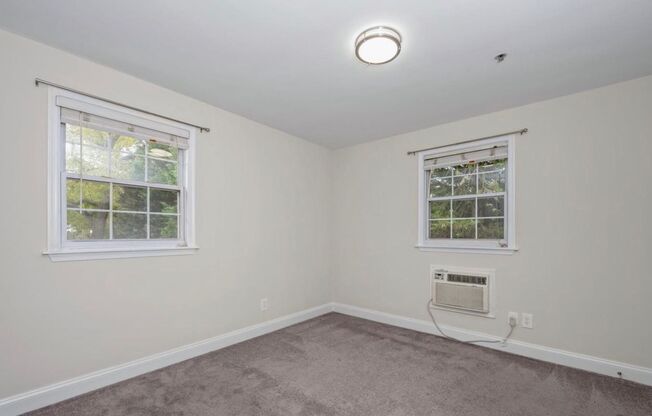 Spacious 1 + 1 Condo in quiet walk up Bldg.