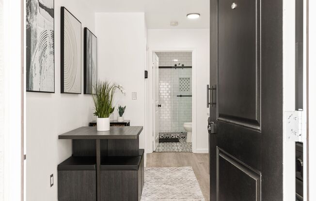 A 2 Bedroom, 1 Bathroom apartment with common areas and a fully functional kitchen at 1702 Malcolm Ave.