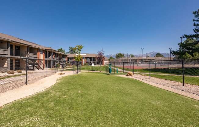 our apartments have a fenced in yard with grass