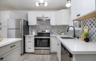 Breathtaking Renovation! Oversized 2 Bed 1.5 Bath Townhome! Ready Now! Don't Miss Out!