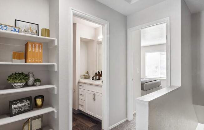Model bathroom with a sink and a mirror