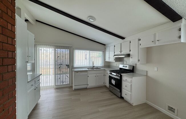Adorable house in awesome Carson location w/beamed ceilings, fireplace, large yard, central A/C & 2-car garage