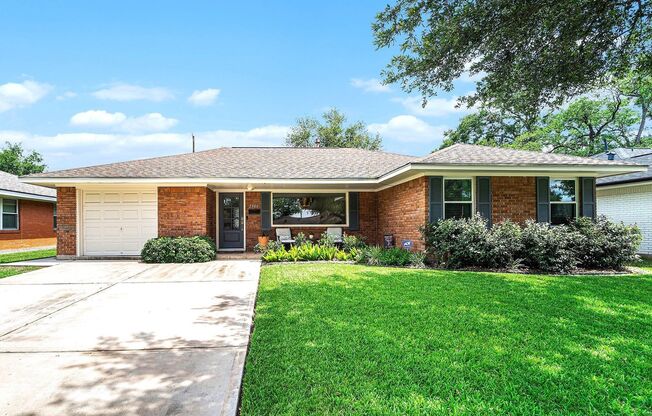 Beautifully Updated Home in Oak Forest with Spacious Yard and Prime Location