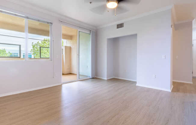 Living Room with Balcony and Hard Surface Flooring