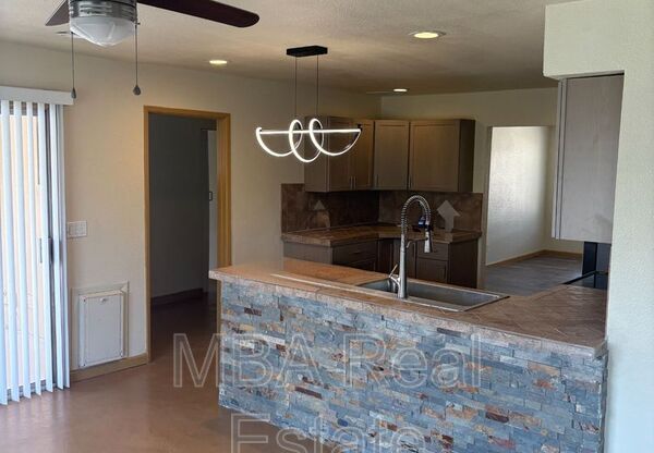 4027 E WINDROSE DR
