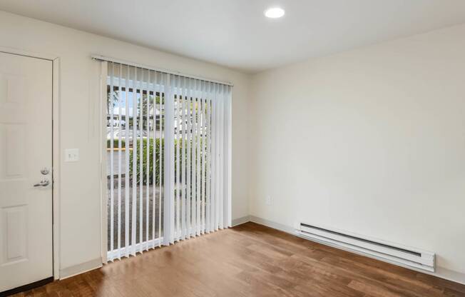 Living room with Patio Access at Glen at North Creek, Washington
