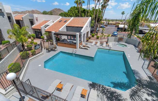 take a dip in the pool at the enclave at woodbridge apartments in sugar land, tx