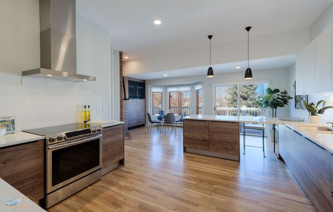 Breathtaking Waneka Lake Ranch with Mountain Views, Designer Finishes & Walk-Out Lower Level