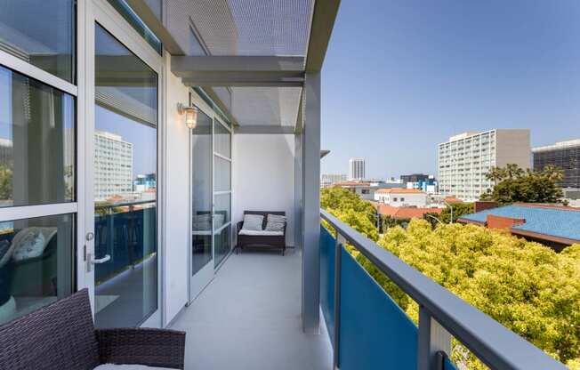 a balcony with a view of the city