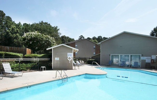 our apartments have a large pool and lounge chairs