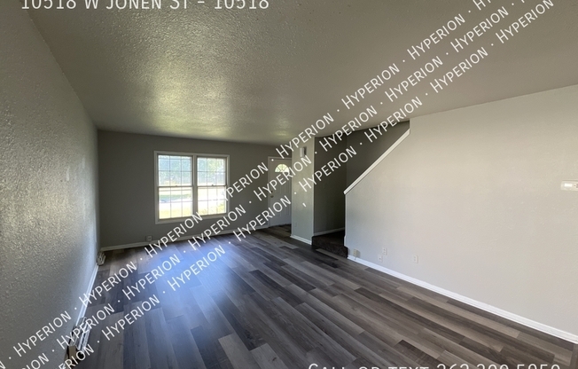 10518 W JONEN ST