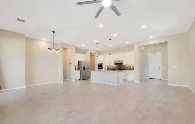 Just a year old in highly sought after GATED area of Goodyear!