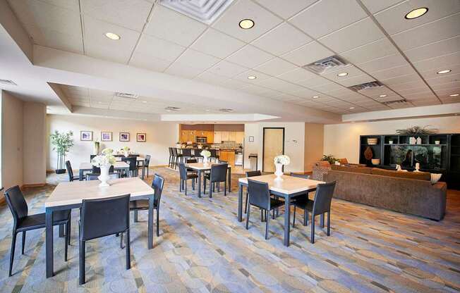 A large dining area with tables and chairs.