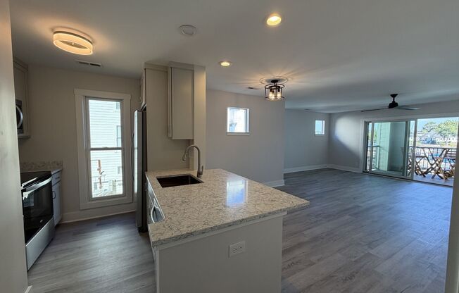Breathtaking 2 Bed/2 Bath Condo - Second Floor - Newly Renovated - Covered Balcony - Community Amenities - Washer/Dryer Included