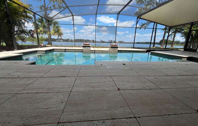 Luxurious Pool Home with Stunning Lake Views in desired Orlando neighborhood.