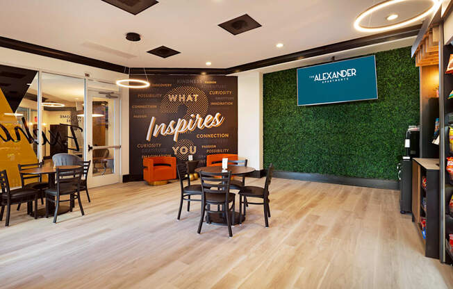 A store interior with wooden floors and a green wall with a sign that says "Alexander".