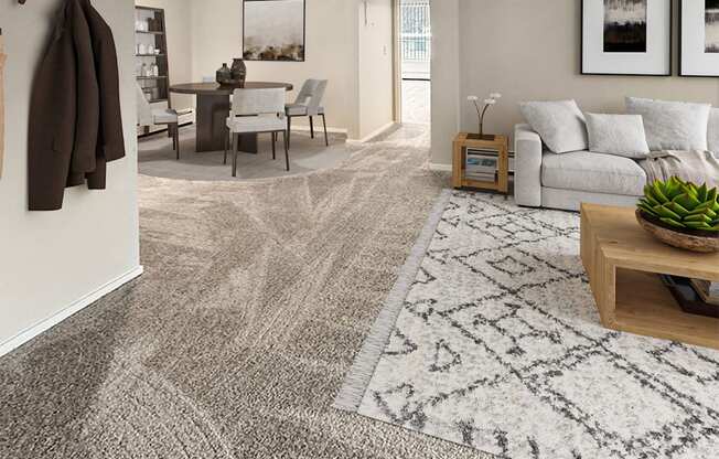 A living room with a grey rug and a brown jacket hanging on the wall.