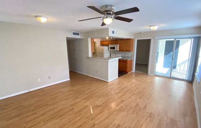 2br/2ba Tradewinds Condo with Wood Floors & W/D!