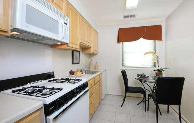 Kitchen With Dining at Rockdale Gardens Apartments*, Baltimore, Maryland