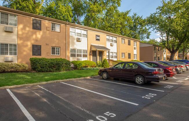 a car parked in front of a brick building